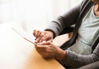 Elderly female resident using an ipad
