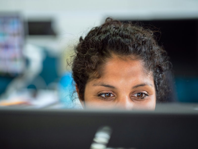 Staff member working on computer