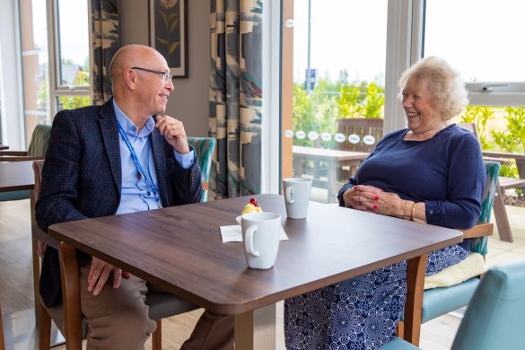 Lace Housing staff meeting with resident for a coffee and cake